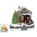 ESCENA NAVIDAD CASA SANTA CLAUS CON LUCES LED, MOVIMIENTO Y MUSICA. MEDIDAS: 20X15,5X18 CM.